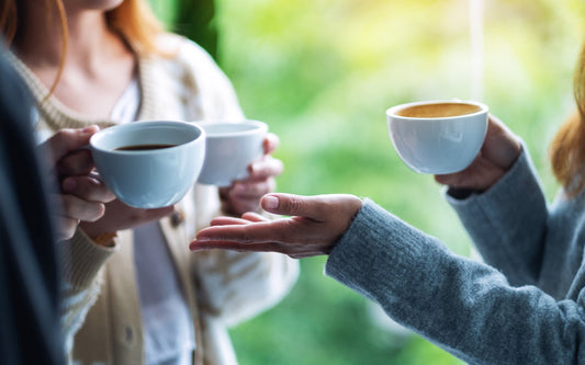 A group of people sip coffee together. What's the connection between coffee and gas? Learn more in our ultimate guide.