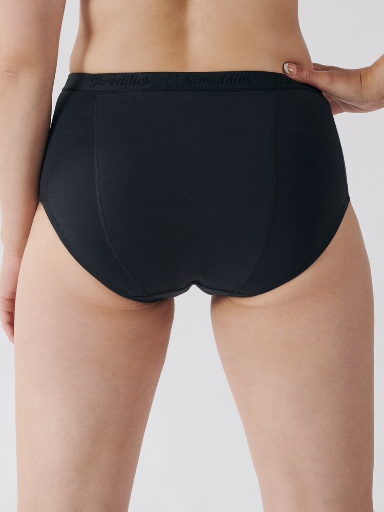 The ladies hi-waist brief fits higher on the waist, above the hips, and lower on the leg than our regular brief. This classic look gives added comfort and confidence a woman needs while still maintaining the flatulence filtering characteristics of Shreddies.