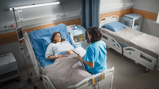 A woman rests in a hospital bed. Gas after gallbladder removal is normal—bile now drips constantly instead of releasing on demand. Learn why it happens, how long it lasts, and how to manage it.