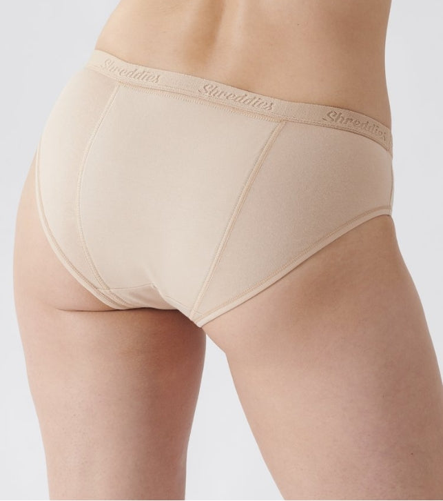 Shreddies Women's Bikini Brief in beige is both fart-filtering and comfortable. Made with activated carbon cloth to absorb and eliminate flatulence odors, Shreddies underwear offers freedom for sufferers of IBS, Crohn’s disease, colitis, dyspepsia, gastritis, food intolerances and other bowel & digestive disorders.