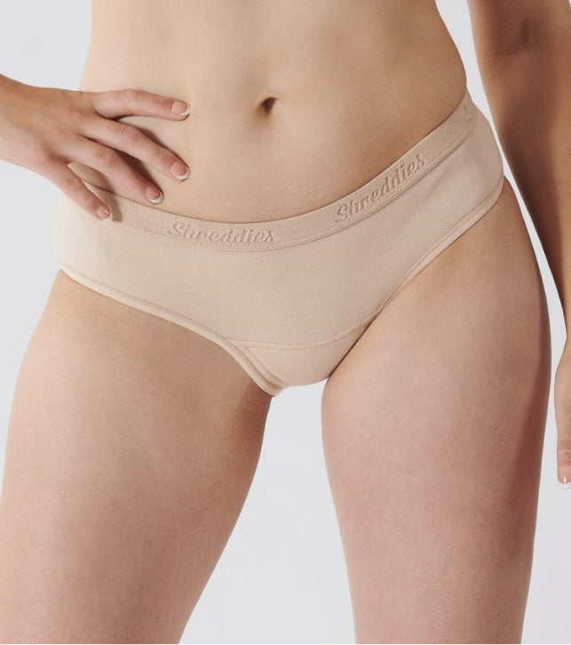 Shreddies Women's Bikini Brief in beige is both fart-filtering and comfortable. Made with activated carbon cloth to absorb and eliminate flatulence odors, Shreddies underwear offers freedom for sufferers of IBS, Crohn’s disease, colitis, dyspepsia, gastritis, food intolerances and other bowel & digestive disorders.